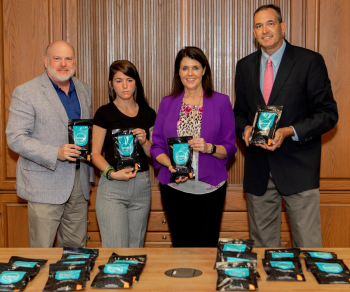 Community Connections Inc. members holding Deterra Pouches